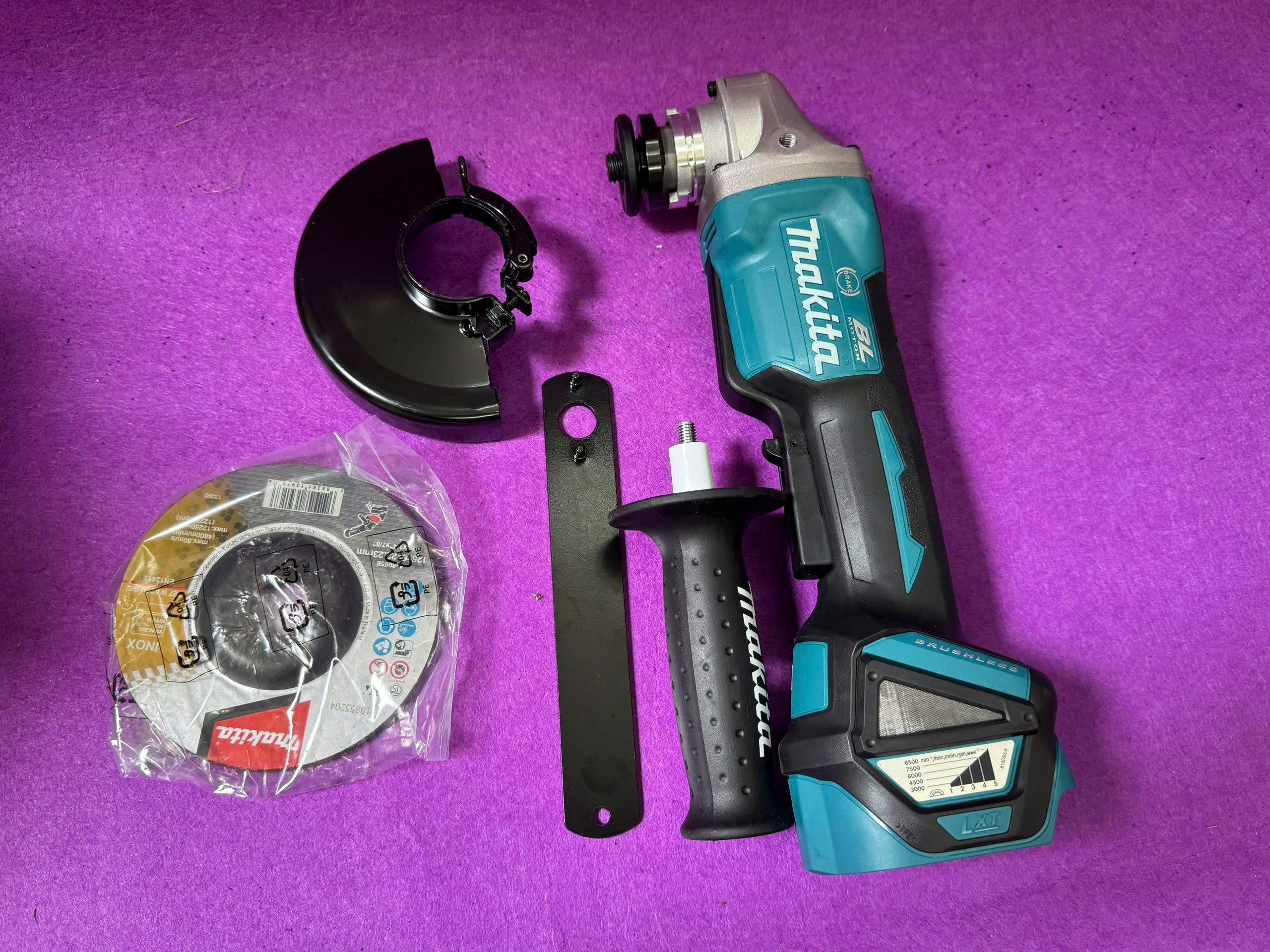 Máy mài góc dùng pin Makita DGA518Z (125mm/công tắc bóp/AWS/BL) (18V) 1