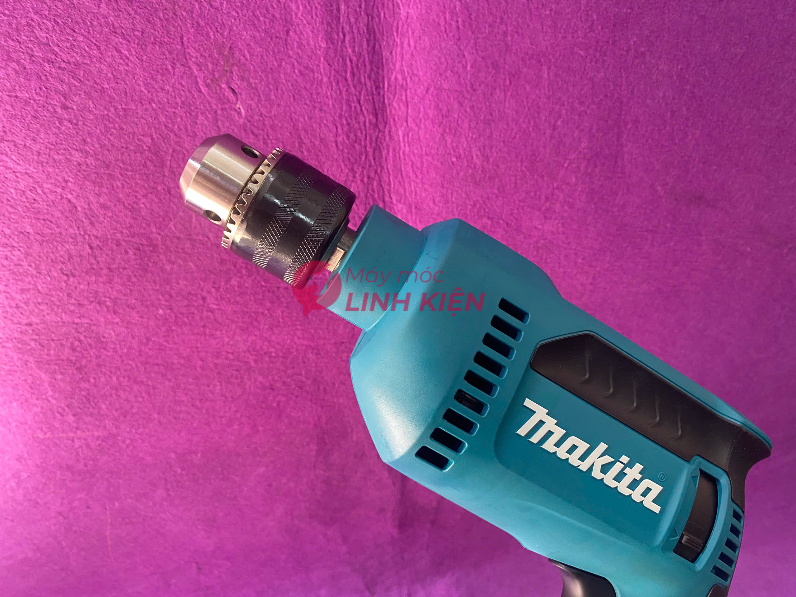 Máy khoan 630W Makita DP4020 2