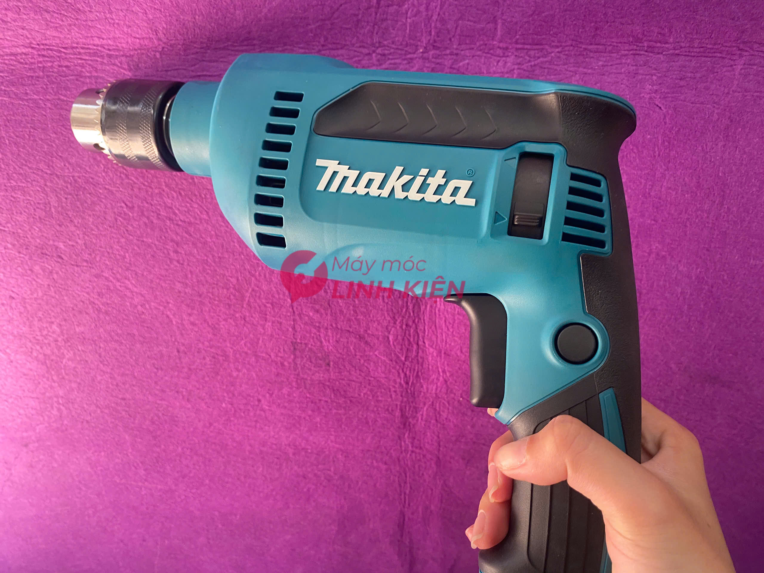 Máy khoan 630W Makita DP4020 3
